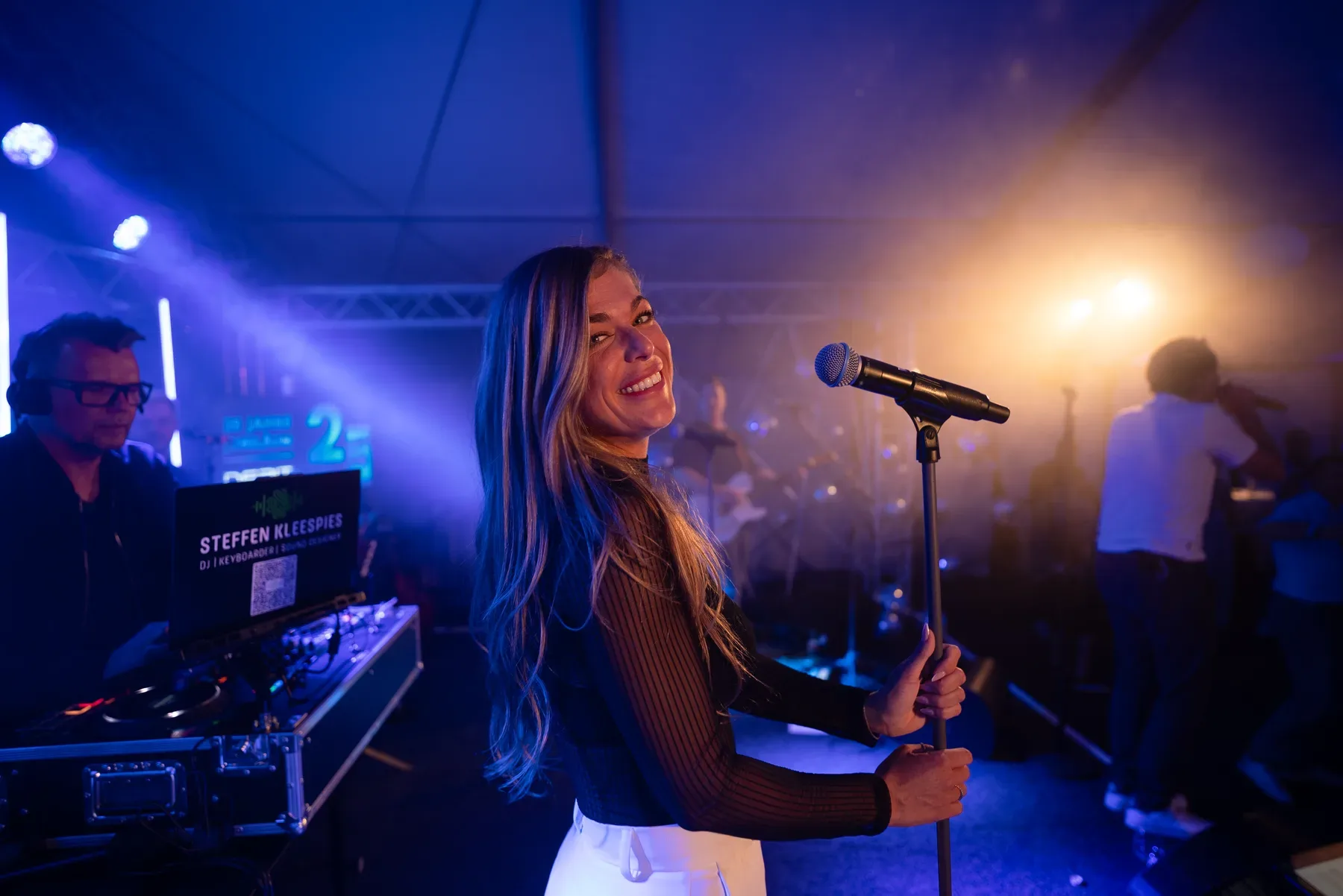 Eventfotografie am Abend: Partystimmung und Tanzfläche beim Firmenjubiläum