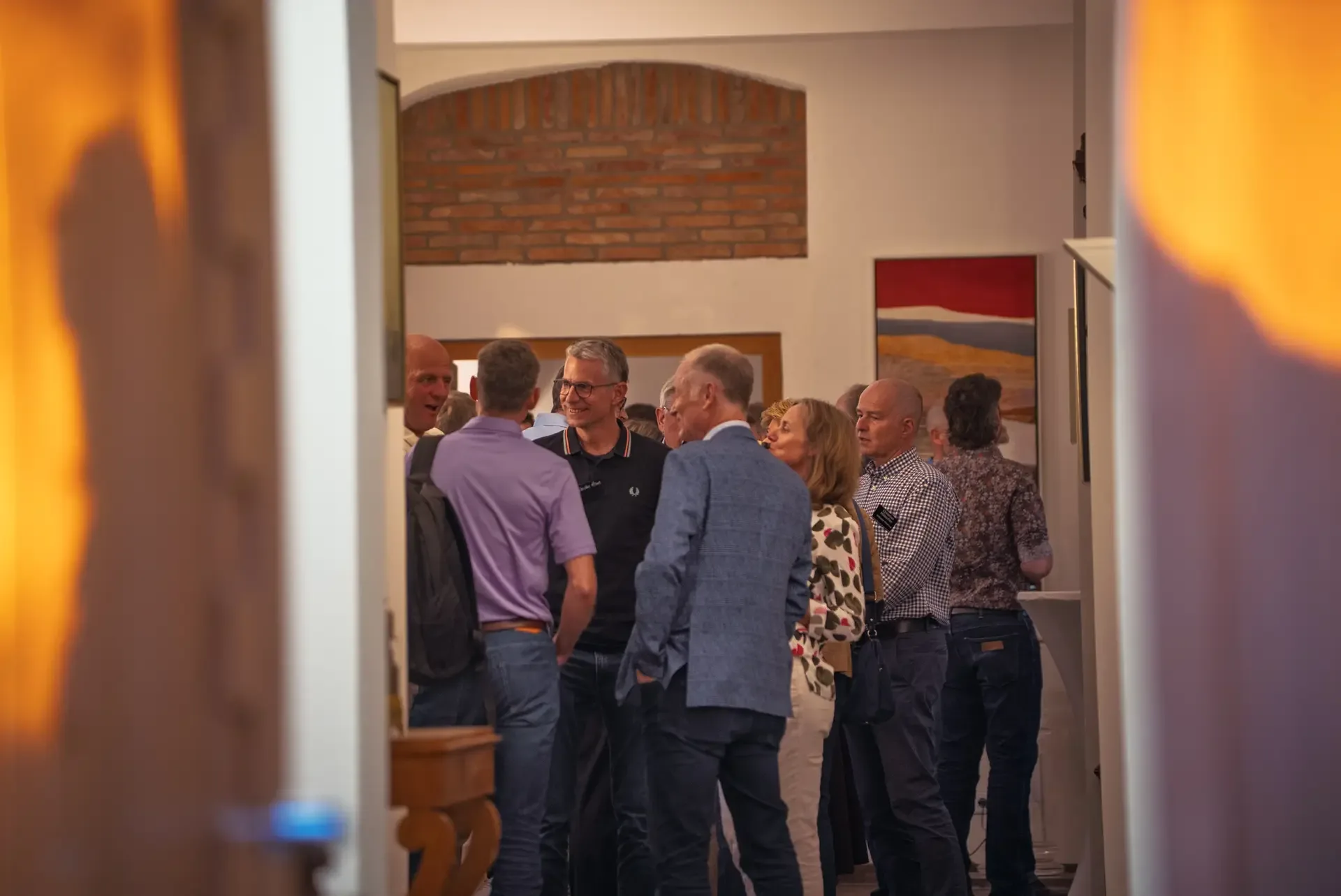 Eventfotografie beim PROMADE Business-Event in Aschaffenburg: Gäste im Gespräch